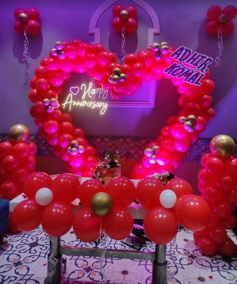 Heart shaped red balloon anniversary decor