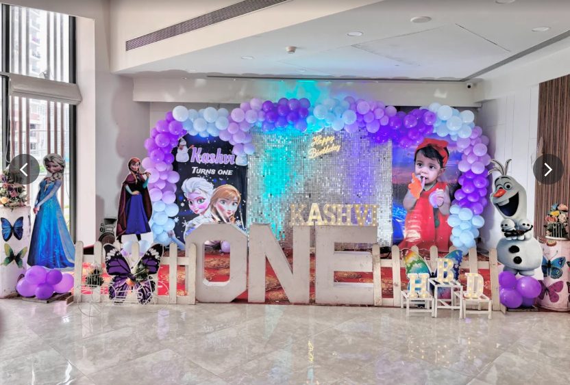 Frozen theme first birthday balloon arch decor