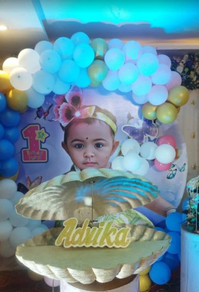 Shell themed first birthday backdrop by Aarsh Event's